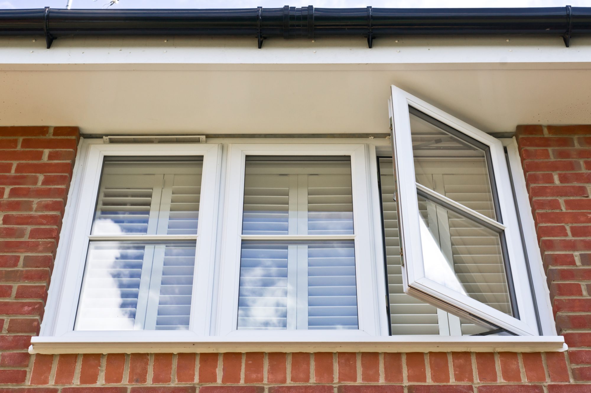 A modern double glazed window set in a house